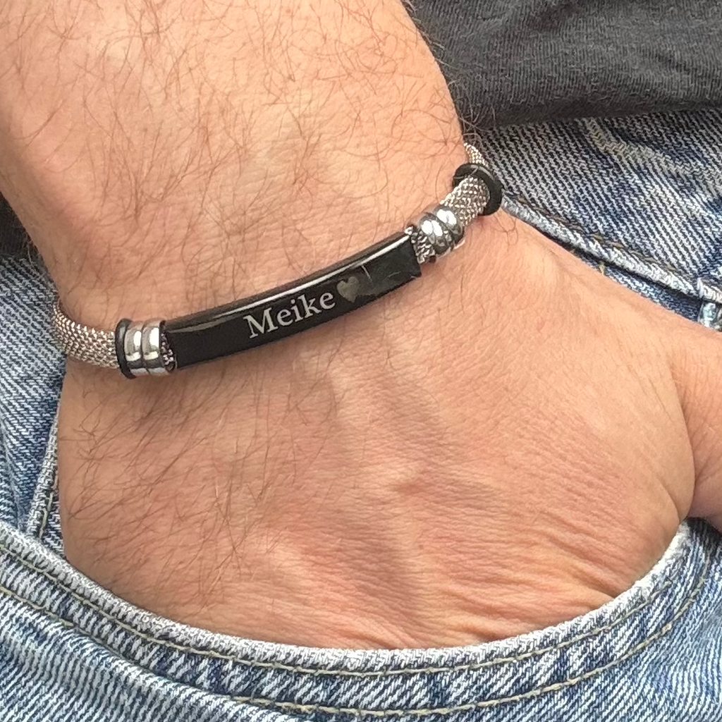 Vintage Edelstahlband mit Gravur.