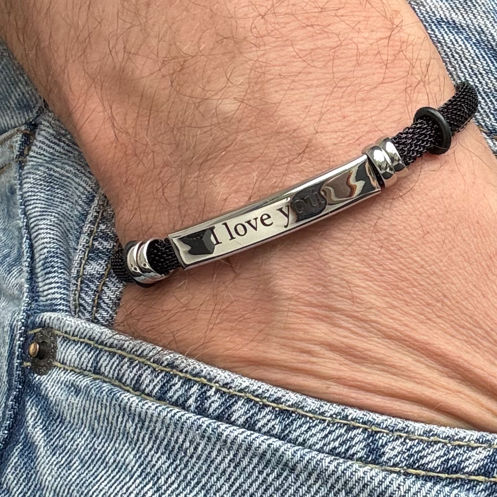 Vintage Edelstahlband mit Gravur.